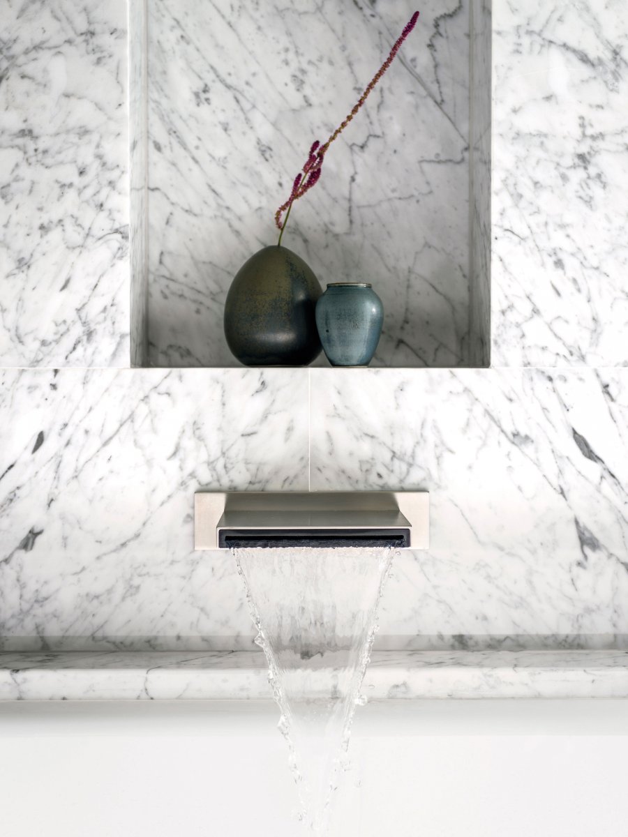 A designer Dornbracht bath tap and Statuarietto marble