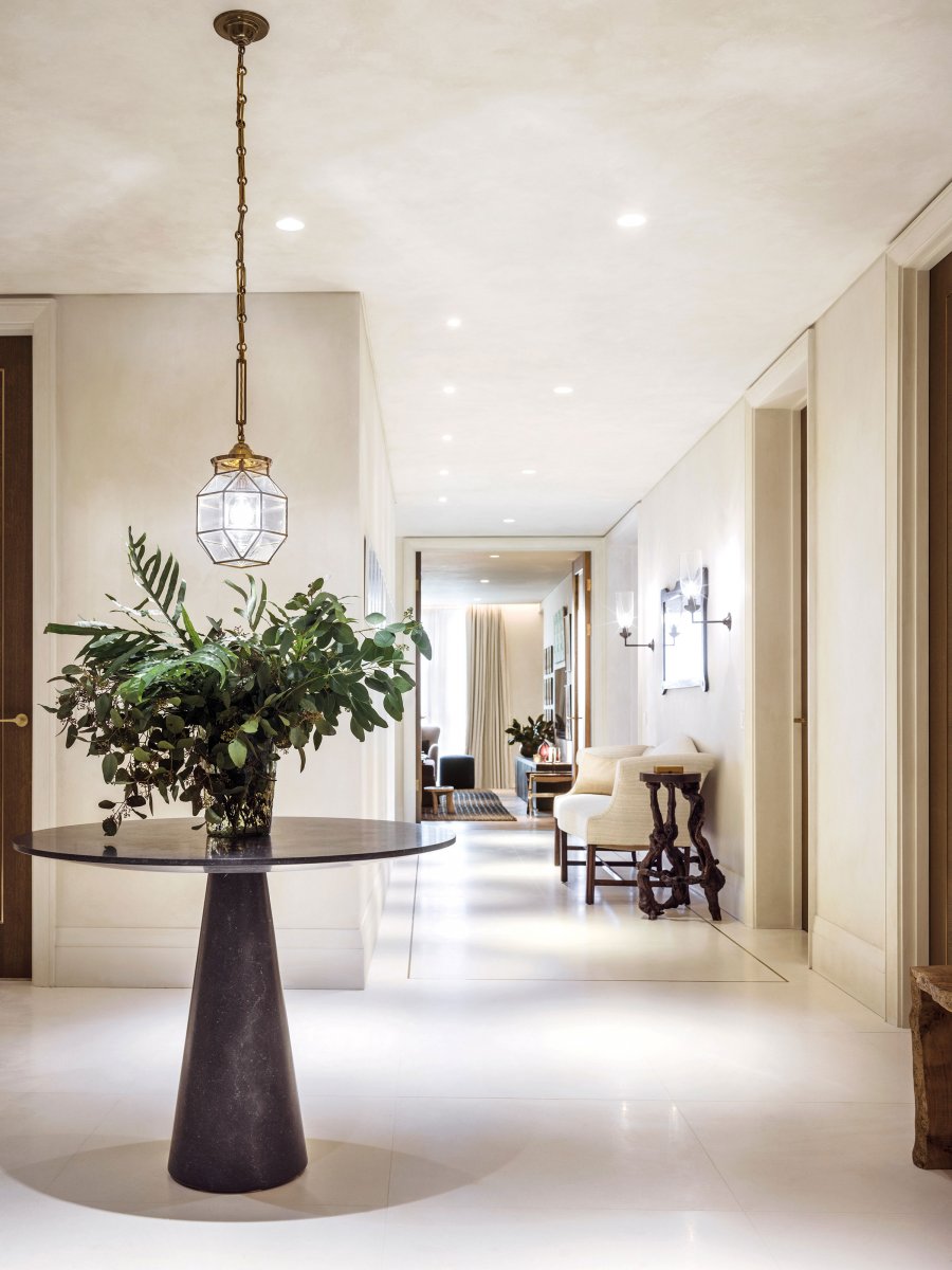 Generously sized hallway with view to second reception room