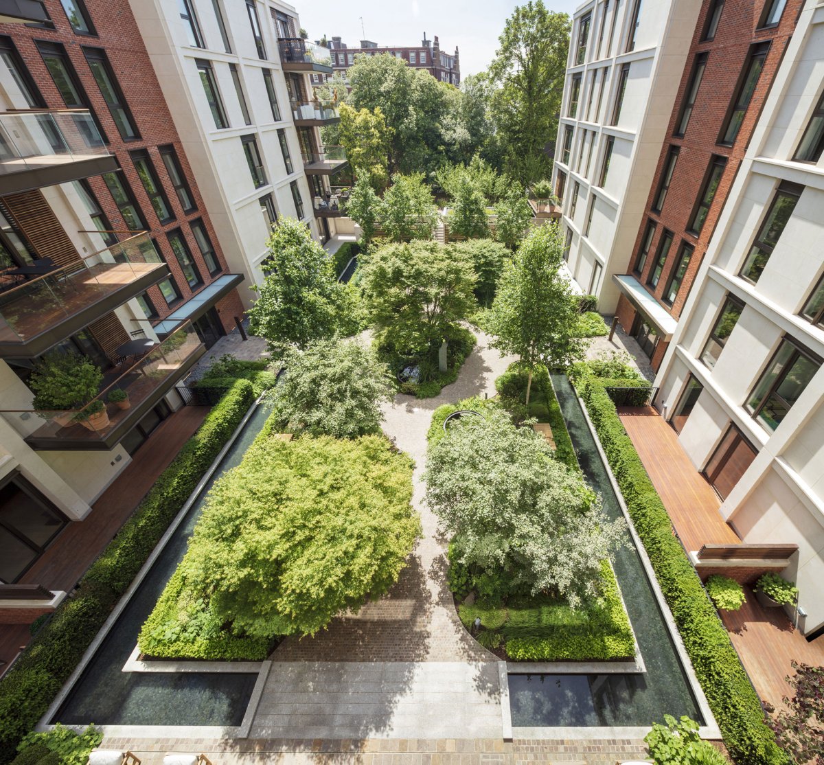 Reflection pools sit within soft planting