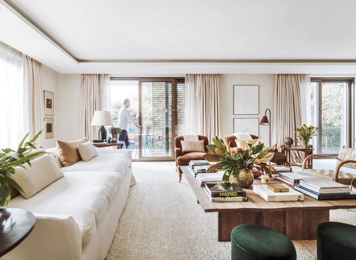 Bright and inviting main reception room with balcony overlooking parks