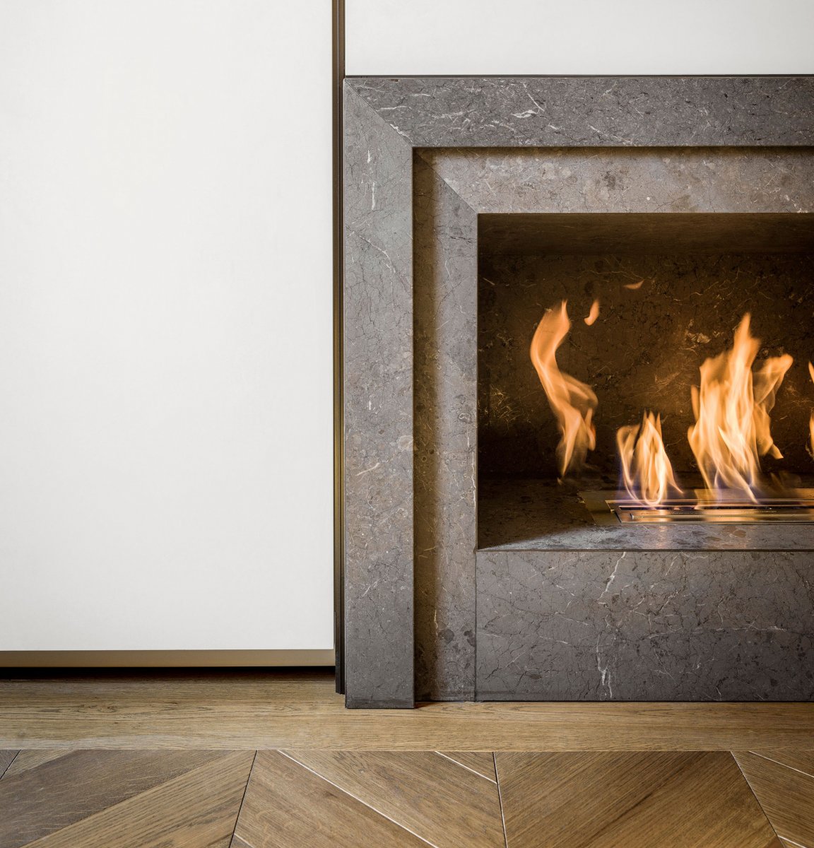 Dark marble fireplace in the main reception room